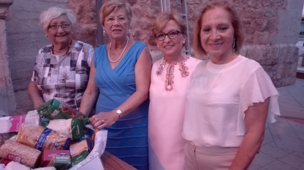 OFRENDA DE FLORES Y ALIMENTOS